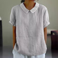 Camicia donna con scollo a revers e maniche corte, stile casual, marca Valstrend, in tessuto leggero e morbido.