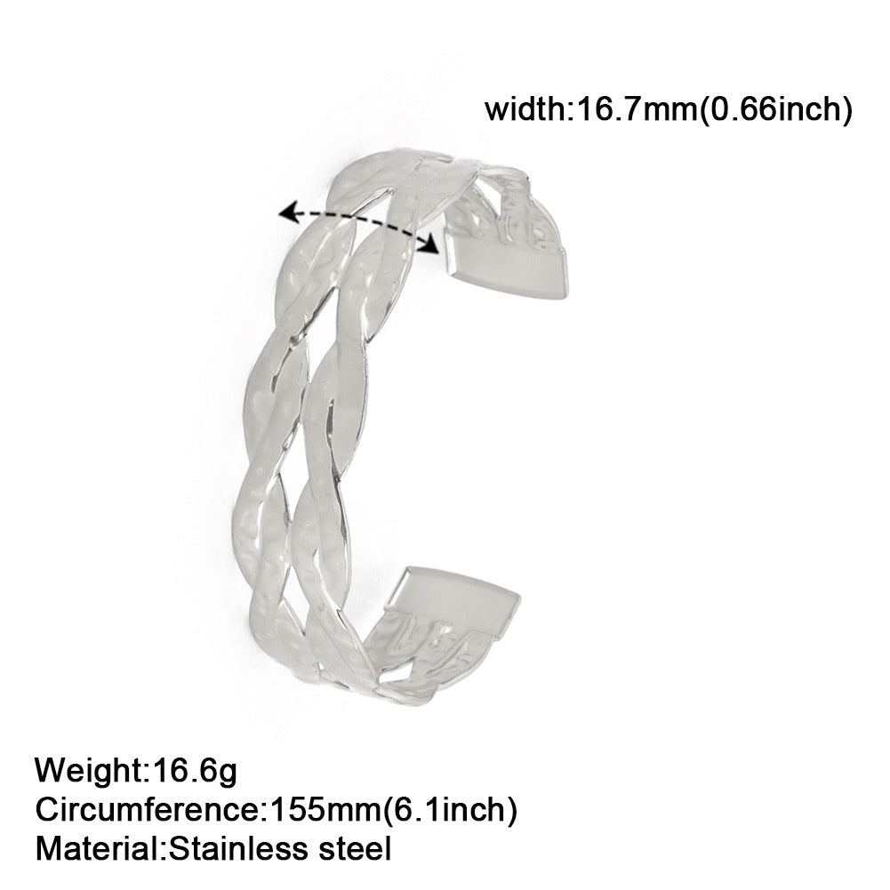 Bracciale di lusso Valstrend con doppio twist aperto, stile fashion e design elegante, accessorio alla moda per ogni occasione.