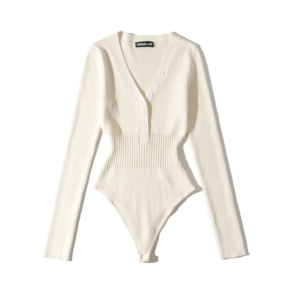 Tuta lunga Valstrend con scollo a V profondo, cintura con fibbia, maniche lunghe e design a vita alta, in tessuto nero.