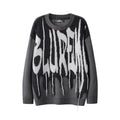 Maglione oversize stile Idle di Valstrend, morbido e comodo, indossato da uomo e donna, tessuto a maglia rilassata e versatile.