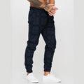 Pantaloni casual stampati Valstrend, modello tapered, in tessuto morbido, indossati da una persona in un contesto urbano.