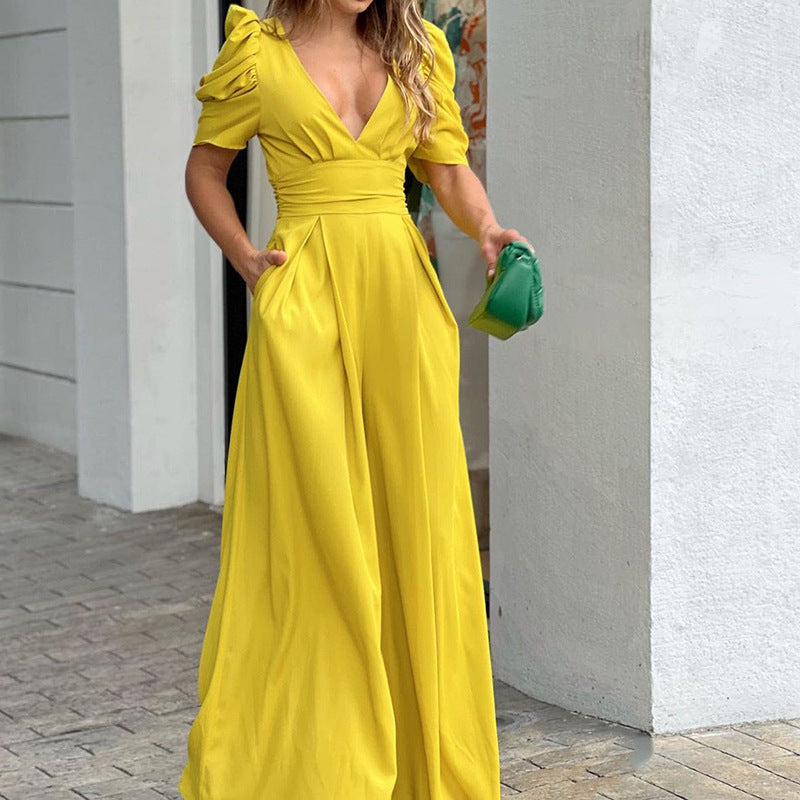 Completo elegante plus size con pantaloni larghi, stile jumpsuit Valstrend, tessuto morbido e silhouette moderna.