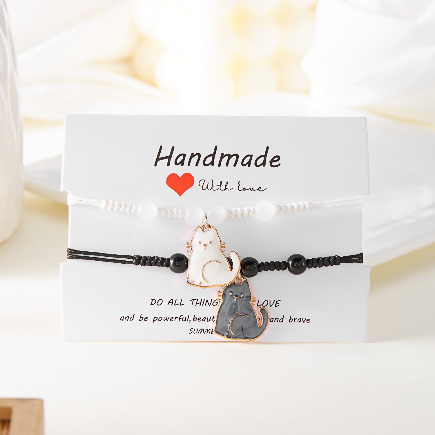 Bracciale per coppia con pendente gattino nero e bianco, elegante e alla moda, bracciale Valstrend con design di gatto stilizzato
