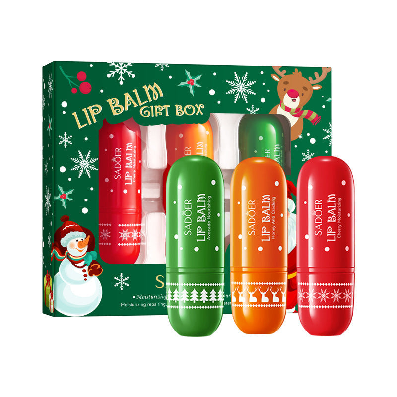 Scatola regalo con rossetti idratanti natalizi in stile inglese, marca Valstrend shop, decorata con motivi natalizi.