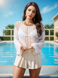 Maglione donna con collo rotondo e trama traforata, maglieria Valstrend con design femminile e dettagli eleganti.