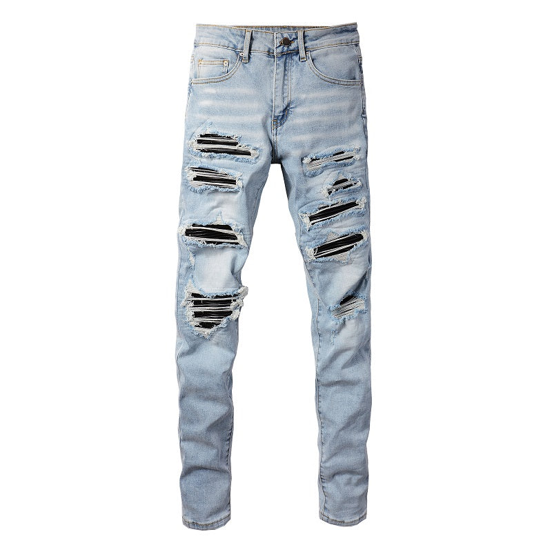 Jeans slim elastic da uomo Valstrend shop con patch in pelle e fori, vestibilità aderente e stile casual.
