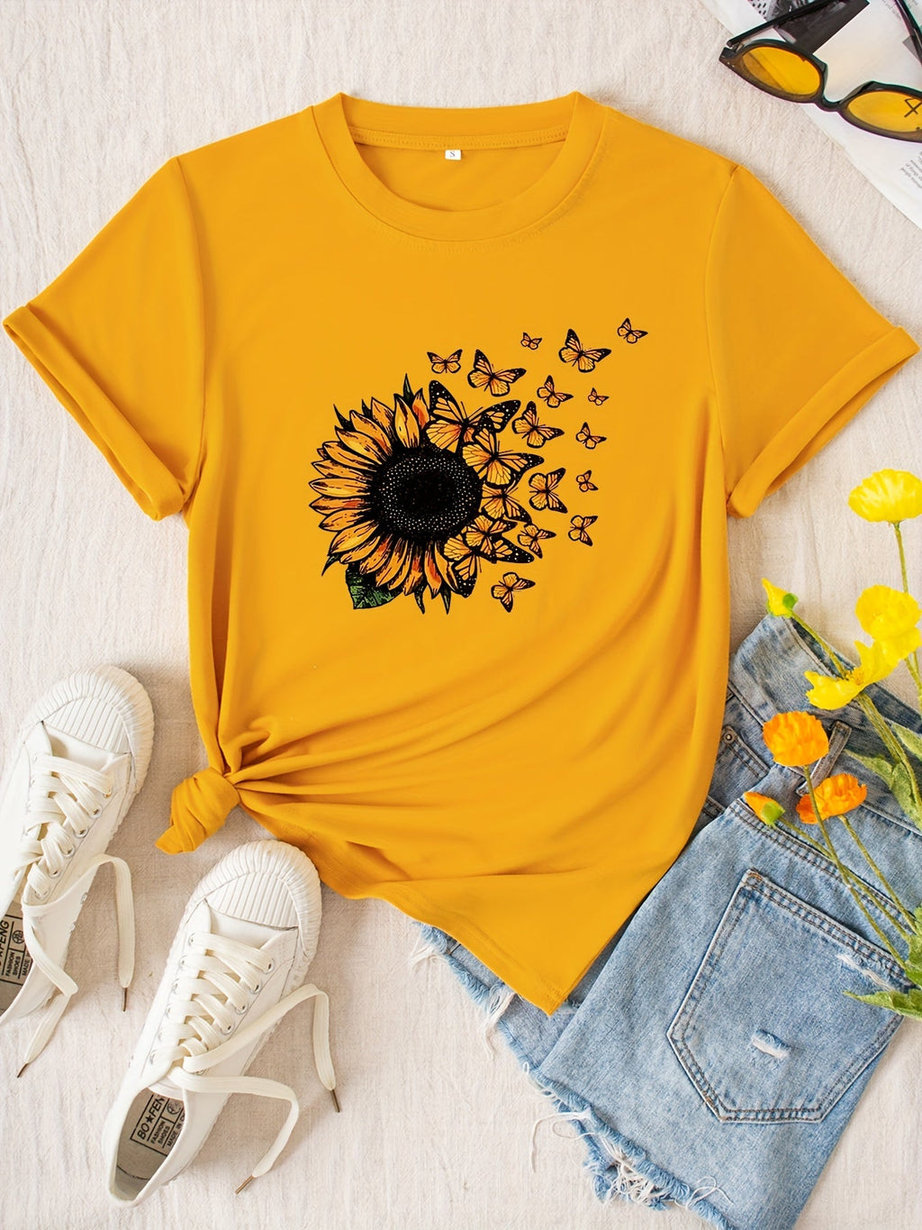 Maglietta donna Valstrend con stampa di girasole, maniche corte, collo rotondo, ideale per estate e primavera.