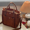 Borsa a tracolla artigianale in velluto a coste Valstrend, elegante e casual, con manico artistico e spazio per oggetti personali.