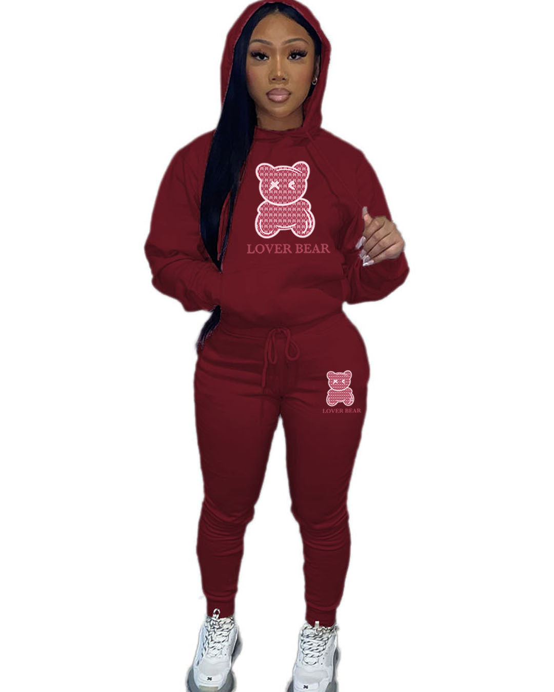 Completo donna Valstrend con felpa con cappuccio e pantaloni sportivi, stile casual e comfort, tessuto morbido e moderno.