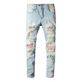 Jeans slim fit Valstrend shop Worn Wash Color INS con effetto usurato e dettagli in denim, mostrati su un manichino.