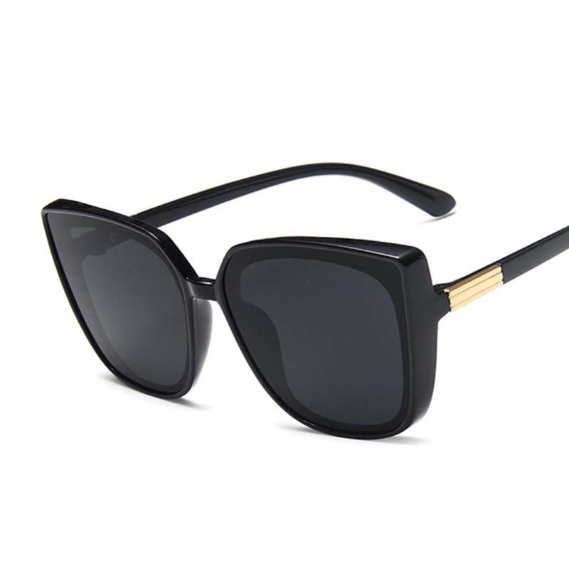 Occhiali da sole quadrati retrò da donna Valstrend, montatura in acetato colorata e lenti scure per uno stile vintage.