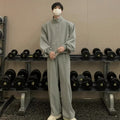 Completo casual coreano Valstrend con pantaloni imbottiti, top con colletto e spalline, stile informale e confortevole.
