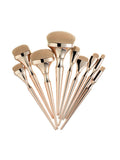 Set di 9 pennelli per trucco con finitura dorata, penne da dentifricio, ideale per applicazioni di bellezza e make-up.