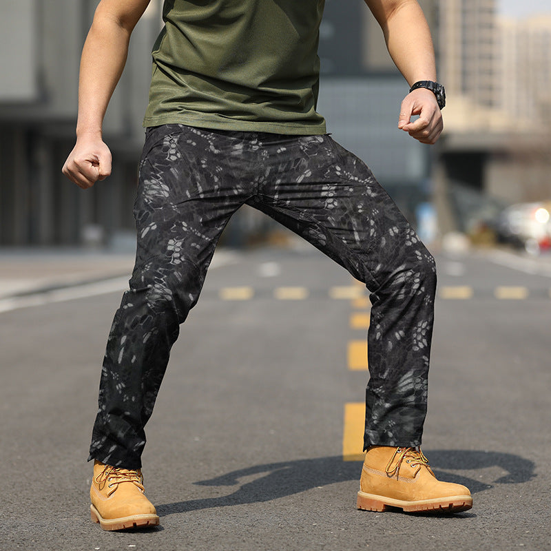 Salopette da uomo valstrend outdoor IX7 con molte tasche, resistente e pratica per attività all'aperto, vista frontale con dettagli.