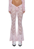 Pantaloni larghi donna in pizzo elasticizzato Valstrend, stile ampio e elegante, visualizzati in immagine con dettagli di tessuto.