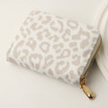 Portafoglio donna con stampa leopardata Valstrend, in eco-pelle leggera con chiusura lampo, slot per carte e ID.