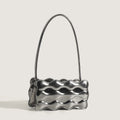 Borsa donna in vernice lucida Valstrend, elegante con manico e dettagli metallici, stile raffinato e moderno.