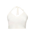 Completo femminile romantico con cardigan a maniche lunghe, gonna e camicia, stile elegante e femminile.