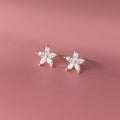 Orecchini a perno donna Valstrend in argento sterling S925 con fiore a cinque petali e diamanti.