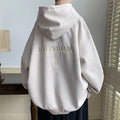 Giacca da uomo ampia in fleece con cappuccio Valstrend, morbida e comoda, in colore nero, vista frontale.
