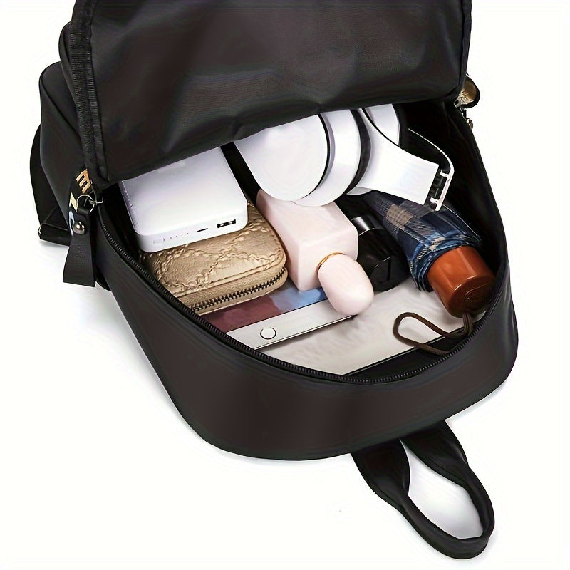 Zaino casual in nylon Valstrend con lettere alfabetiche, chiusura a zip, spallacci regolabili e interno in poliestere resistente.