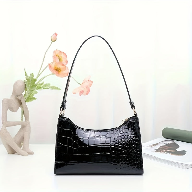 Borsa a spalla Valstrend con motivo rettile, dettagli glitter, in eco-pelle resistente, con chiusura zip sicura, stile elegante e pratico.