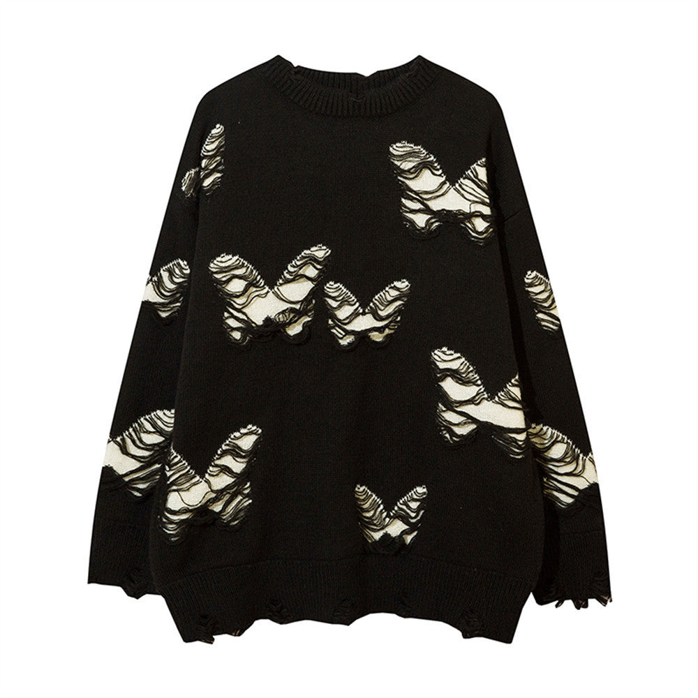 Maglione girocollo a maglia con nappine, motivo a farfalla strappata e ricamo all'uncinetto, marca Valstrend.