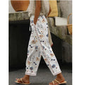 Pantaloni dritti con stampa e ricamo in pizzo, pantaloni casual Valstrend, tessuto leggero e stile elegante.