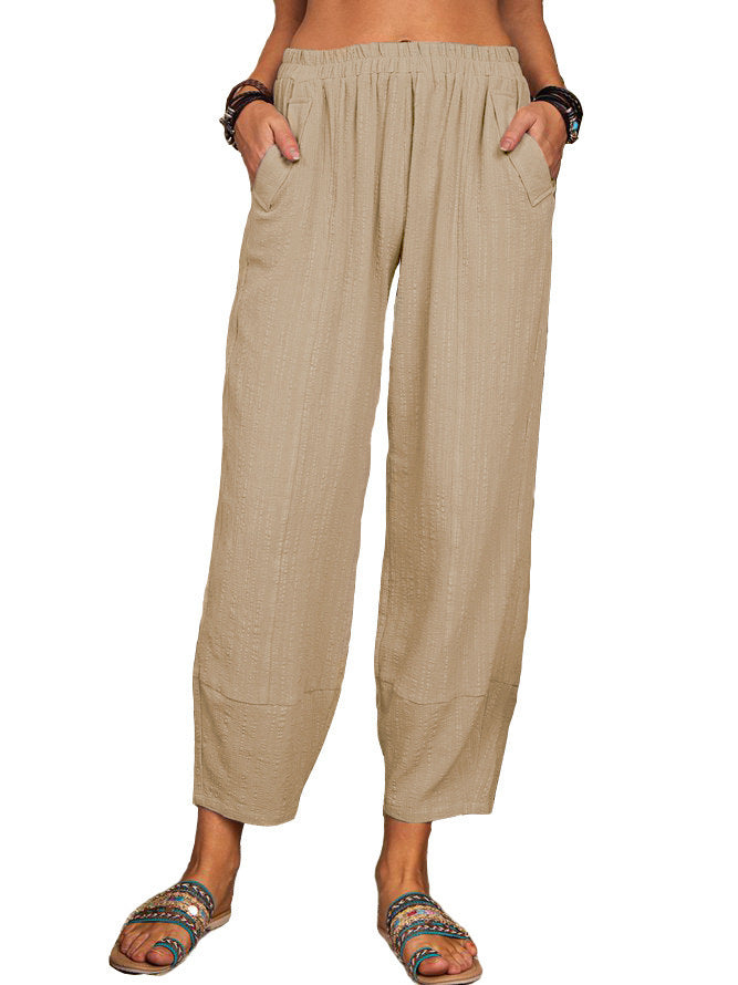 Pantaloni casual larghi donna in cotone e lino di colore solido, comodi e versatili, con taglio rilassato e tessuto morbido.