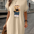 Abito t-shirt casual donna Valstrend shop con stampa orso carina, maniche corte, scollo rotondo, colore beige leggero, stile estivo.