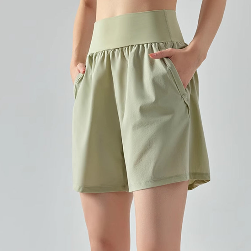 Shorts da yoga da donna Valstrend con vita alta e effetto tummy tuck, tessuto elastico e comodo per allenamenti.