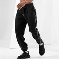 Pantaloni sportivi uomo autunno Valstrend, slim fit e tapered, tessuto leggero per allenamento e attività sportive.