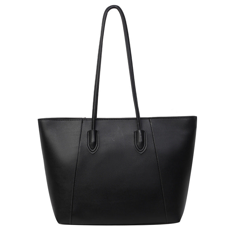 Borsa a tracolla femminile grande capacità, semplice e portatile, di marca Valstrend shop, in tessuto resistente e design essenziale.