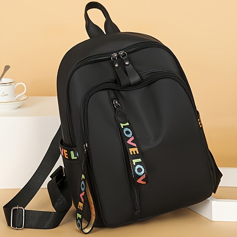 Zaino casual in nylon Valstrend con spallacci regolabili, design alfabetico leggero, chiusura a zip e fodera in poliestere.
