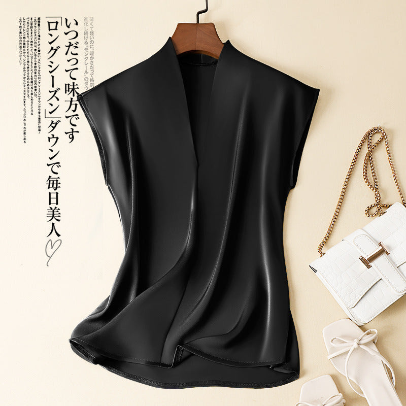 Camicia in seta stile western con scollo a V, senza maniche e ampia, firmata Valstrend, visibile in questa immagine.