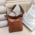 Borsa a spalla in pelle morbida in cera d'olio PU Valstrend, con dettagli eleganti e manico resistente in pelle sintetica.