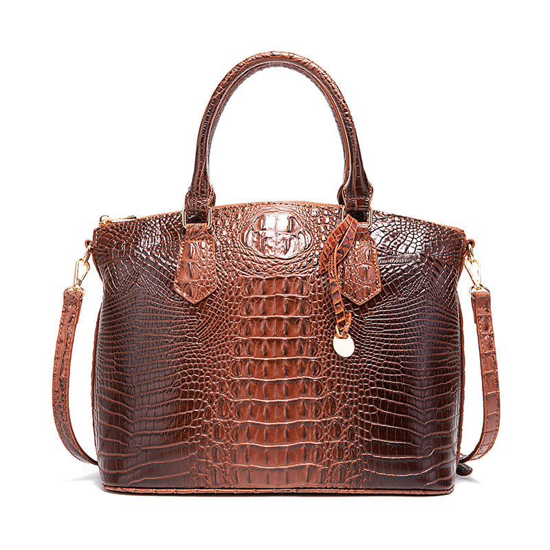 Borsa messenger donna Valstrend con motivo rettile retrò, portatile, con tracolla e dettagli eleganti in stile classico.