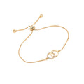 Bracciale regolabile donna Valstrend in ottone dorato con doppio anello, elegante e alla moda.