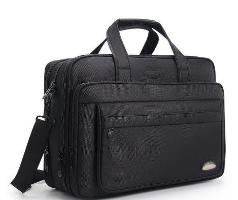Valstrend valigetta da uomo in canvas con grande capacità, ideale per lavoro e viaggi, con manici resistenti e scomparti spaziosi.