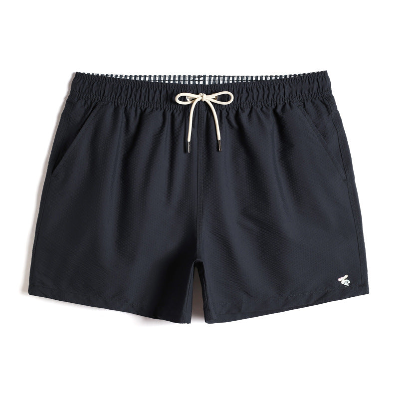 Pantaloncini da uomo Valstrend con fodera, pantaloni da spiaggia larghi e ad asciugatura rapida, mostrati in un'immagine.