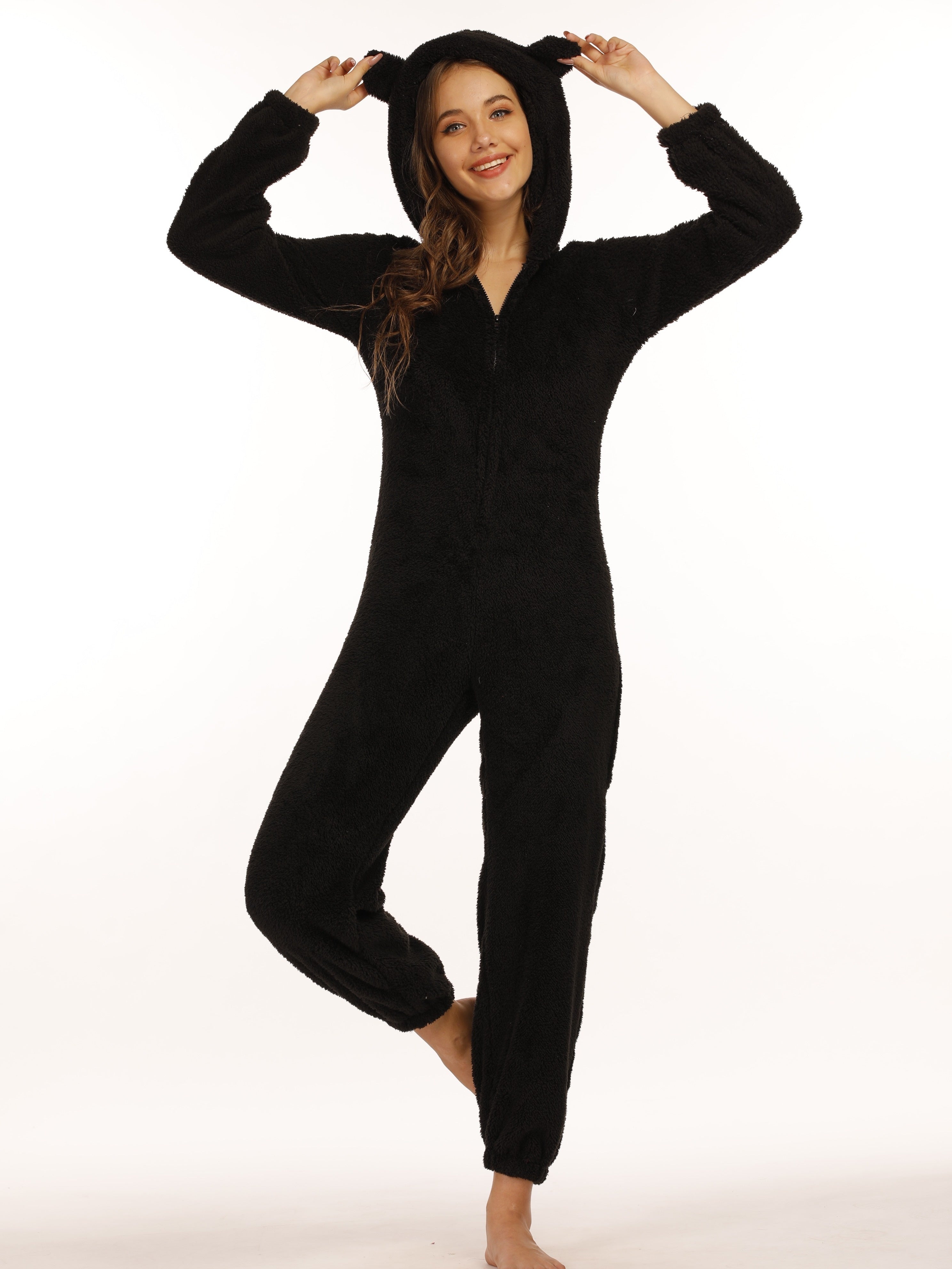 Tuta con cappuccio zip e tasche in tessuto teddy caldo per donna, vestibilità casual, maniche lunghe e stile comodo.