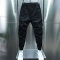 Pantaloni harem elasticizzati a tinta unita con lacci alla caviglia, stile casual e comodo, marca Valstrend.