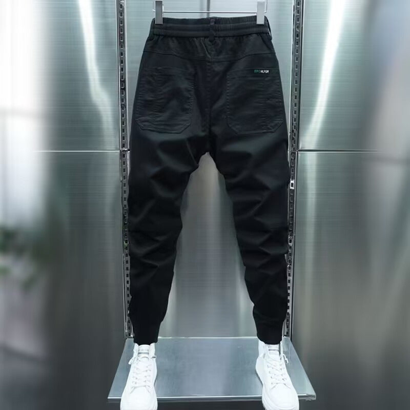 Pantaloni harem elasticizzati a tinta unita con lacci alla caviglia, stile casual e comodo, marca Valstrend.