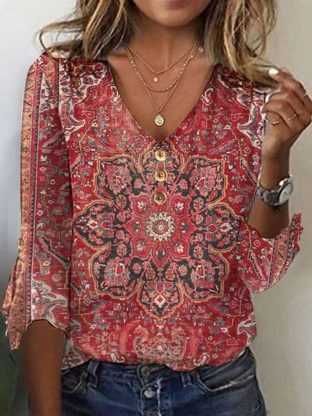 Maglietta con scollo a V, maniche svasate e stampa, stile casual Valstrend. Ideale per look estivi e confortevoli.