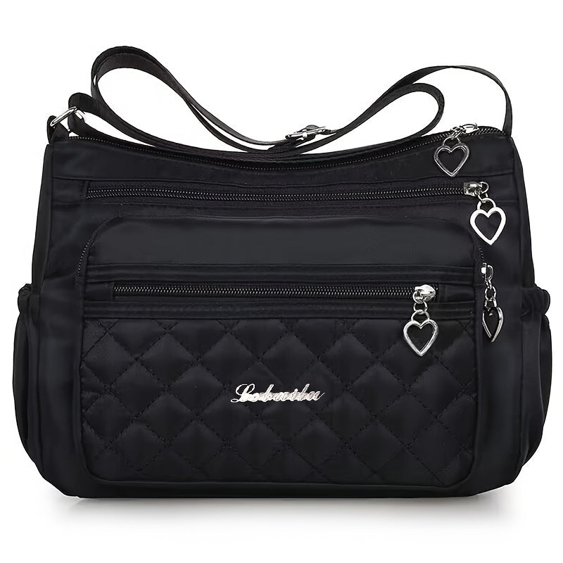 Chic Black Nylon Crossbody Bag for Women - Waterproof, Spacious & Versatile with Adjustable Strap and Tassel Accent, for Autumn, Spring