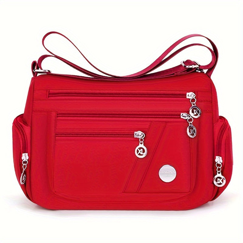 Marsupio casual in nylon Valstrend con dettagli a nappe, tracolla regolabile, tasche multiple e chiusura a zip, interno in poliestere.