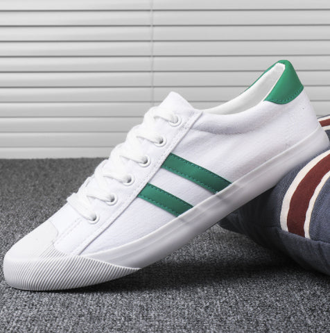 Scarpe da uomo canvas traspiranti Valstrend, modello da ginnastica con suola bianca e design casual, viste di lato.