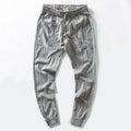 Pantaloni casual larghi in lino con allacciatura a lacci, modello comodo e estivo, marca Valstrend Shop, visibili in immagine.