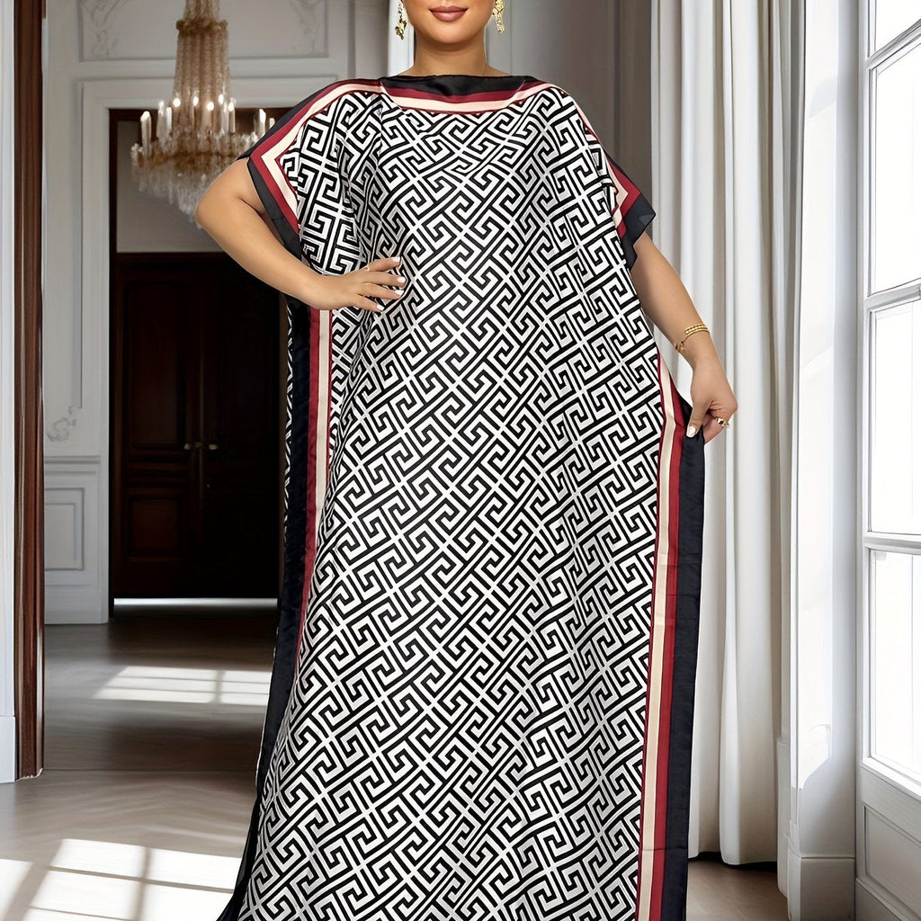 Vestito maxi a fantasia con maniche a batwing per taglie forti, abbigliamento femminile elegante Valstrend, mostra il design.