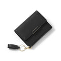 Portafoglio donna semplice Valstrend con portamonete, tasche, frange e design compatto in pelle naturale.